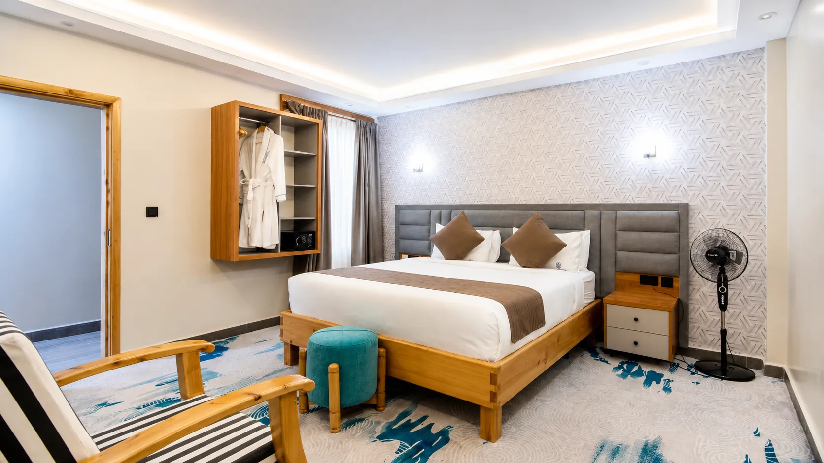 Two-Bedroom Suite Guest Bedroom at Tha Nickolee Hotel