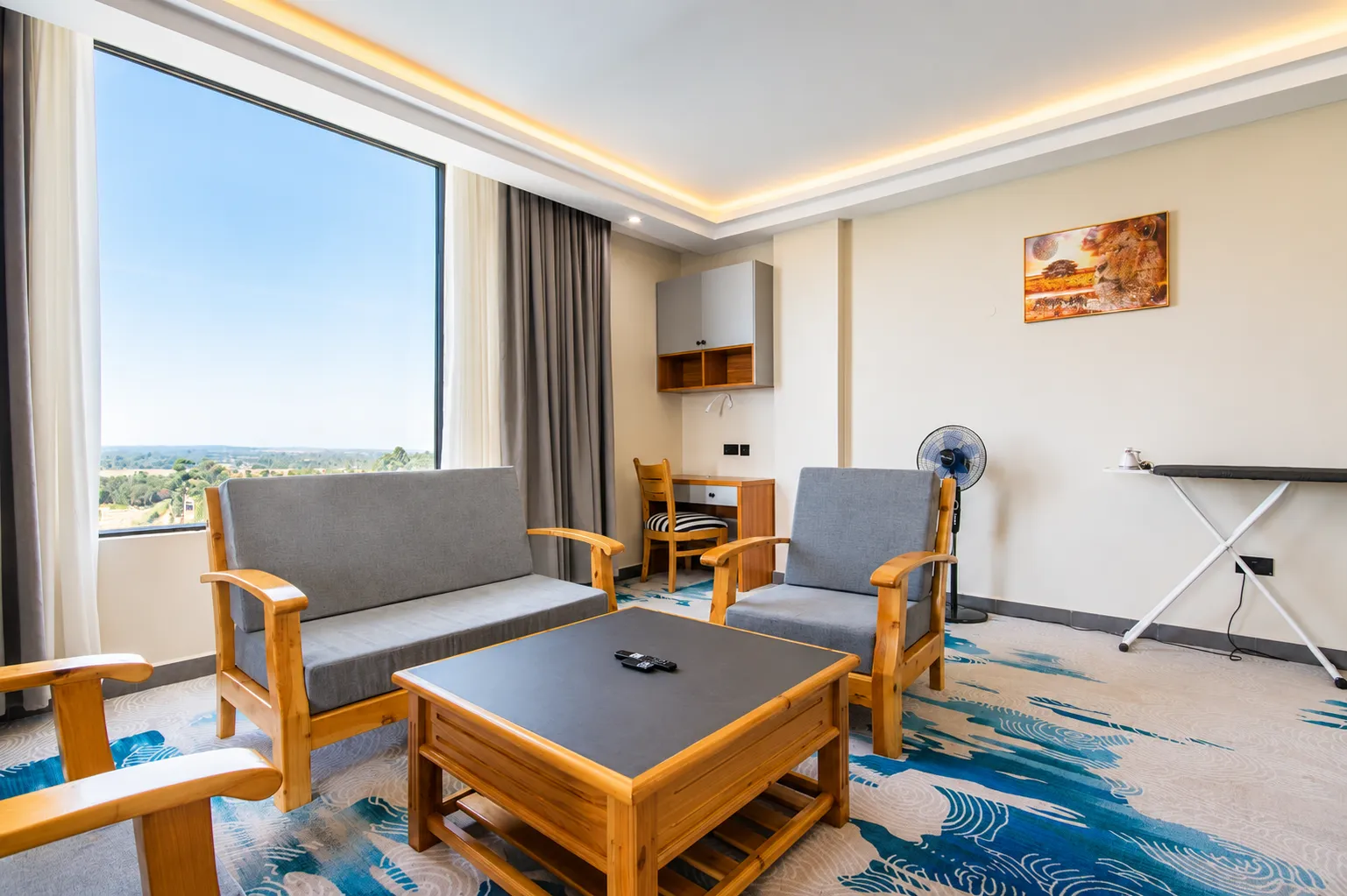 Two-Bedroom Suite Living Area with Workspace & Mt Kenya View