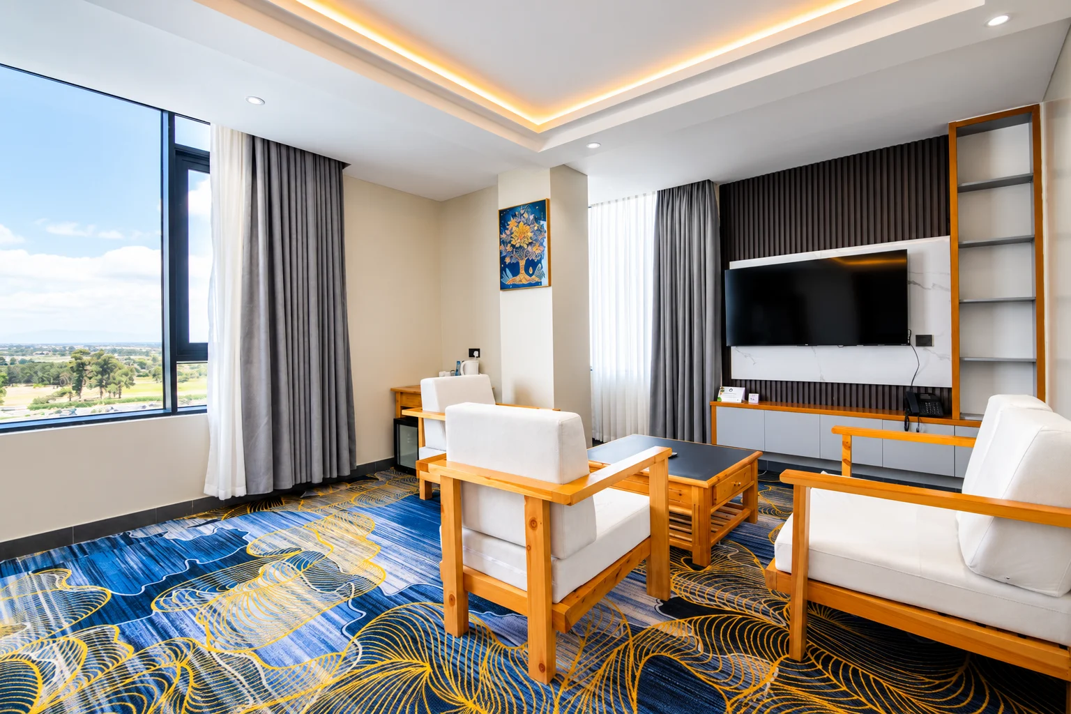 two-bedroom-eaxtra-suite-living-room-mt-kenya-view-tha-nickolee-hotel-nanyuki